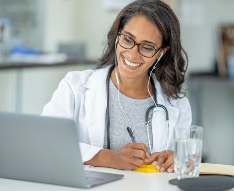 A remote doctor engaged in a video conference with healthcare professionals, discussing collaborative patient care.