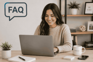 Smiling woman working at a desk with a laptop in a remote business setting